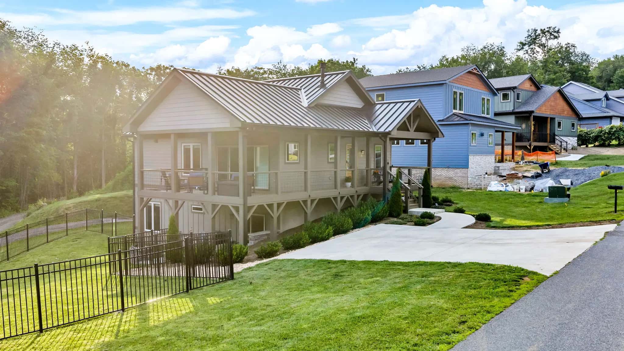 Craftsman-style custom home with a covered front porch and metal roof in West Jefferson, NC